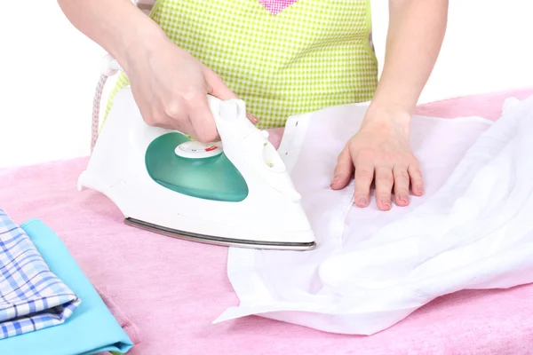 Hausfrau bügelt Kleidung isoliert auf weiß — Stockfoto