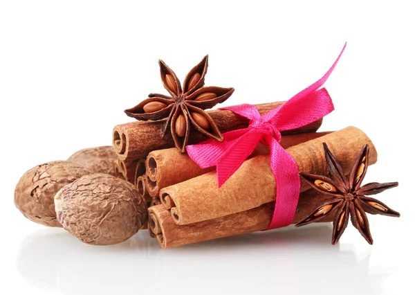 Cinnamon sticks, nutmeg and anise isolated on white — Stock Photo, Image