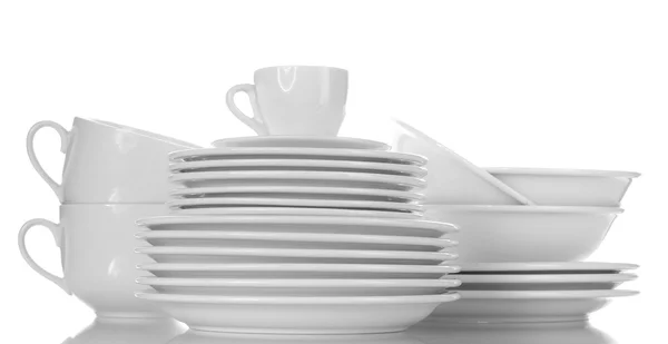 Bols, assiettes et tasses vides isolés sur blanc — Photo