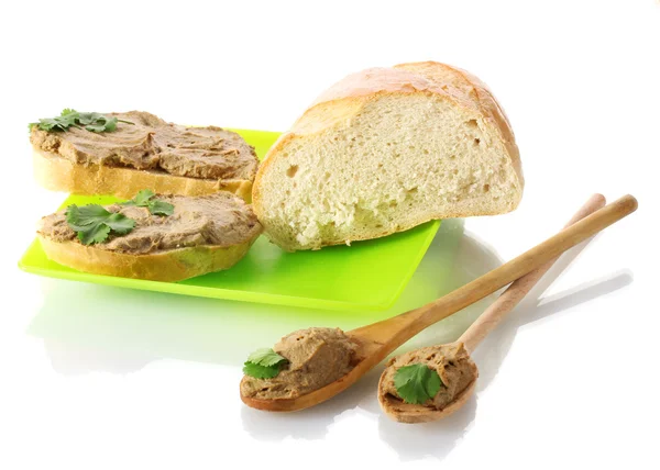 Fresh pate on bread on green plate isolated on white — Stock Photo, Image