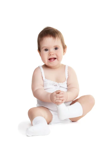 Mignon bébé fille assis isolé sur blanc — Photo