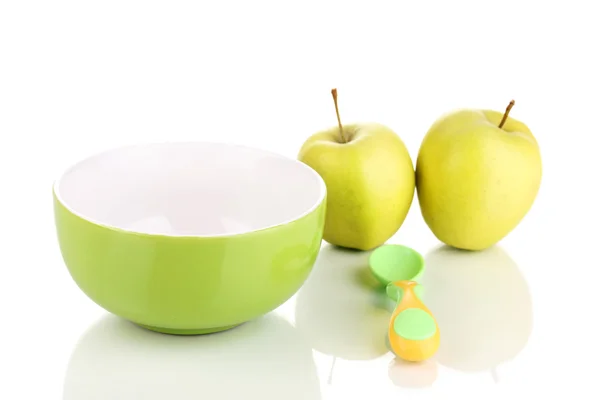 Piatto bambino e cucchiaio con mela isolata su bianco — Foto Stock