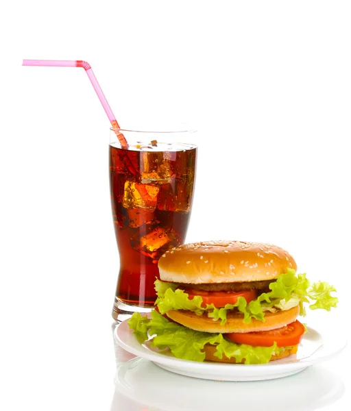 Big and tasty hamburger on plate with cola isolated on white — Stock Photo, Image