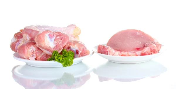 Raw Chicken Drumsticks and pork steak isolated on white — Stock Photo, Image