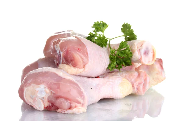 Palitos de pollo crudos en plato con perejil aislado en blanco —  Fotos de Stock