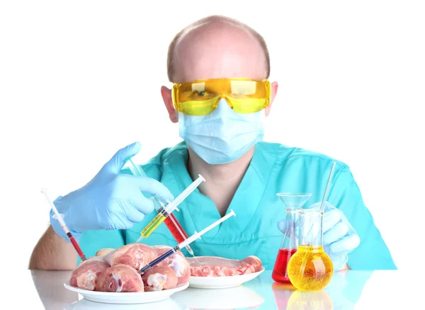 Scientist injecting GMO into the meat — Stock Photo, Image