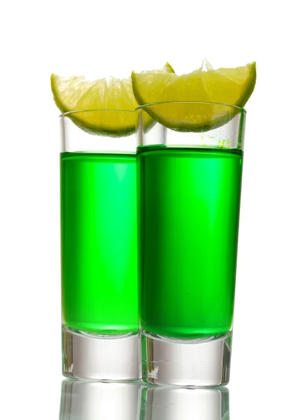 Glasses of absinthe and lime isolated on white — Stock Photo, Image