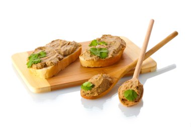 Fresh pate on bread on wooden board isolated on white clipart