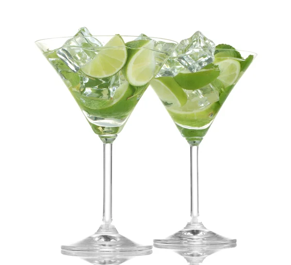 Glasses of cocktail with lime and mint isolated on white — Stock Photo, Image
