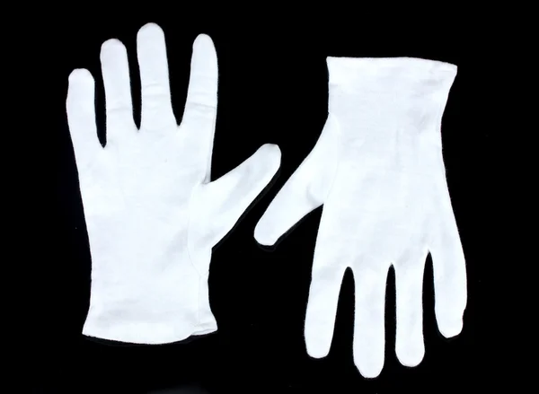 Doek handschoenen op zwarte achtergrond — Stockfoto