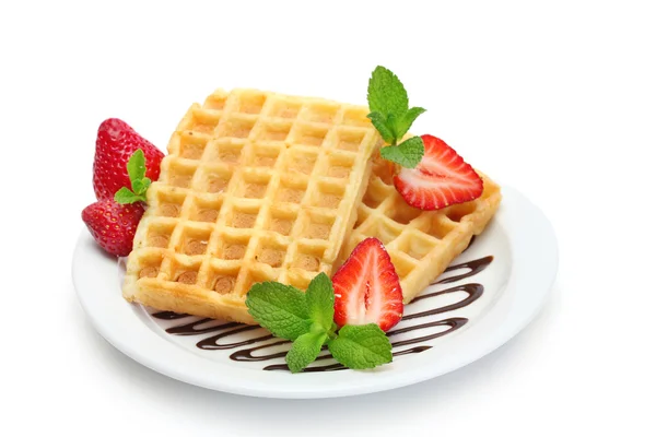 Belgium waffles with strawberries and mint on plate isolated on white — Stock Photo, Image