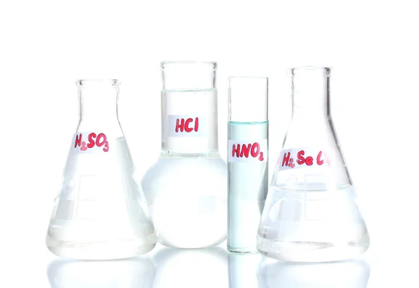 Tubi di prova con vari acidi isolati su bianco — Foto Stock