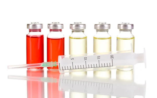 Syringe and medical ampoules isolated on white — Stock Photo, Image