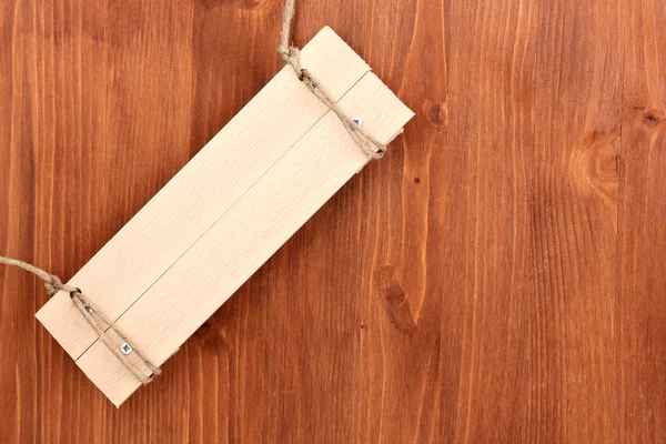 Дерев'яна вивіска на дерев'яному фоні — стокове фото