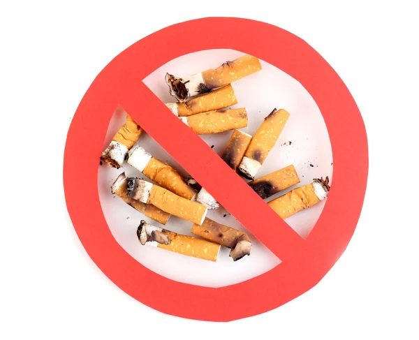 Cigarette butts with prohibition sign isolateed on white — Stock Photo, Image