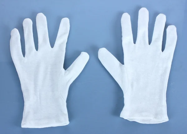 Γάντια ύφασμα σε μπλε φόντο — Φωτογραφία Αρχείου