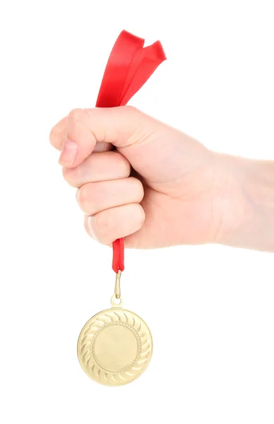 Medalha de ouro na mão isolada em branco — Fotografia de Stock
