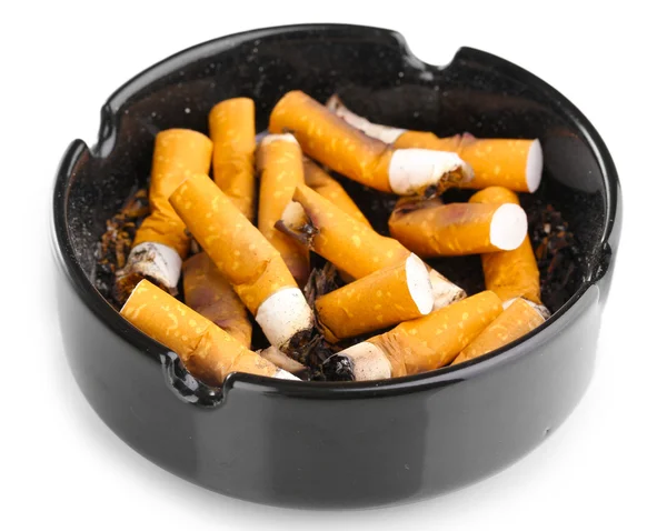 Rabos de cigarro em cinzeiro isolado em branco — Fotografia de Stock