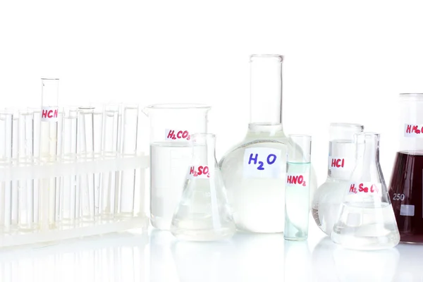 Tubos de ensayo con varios ácidos aislados en blanco —  Fotos de Stock