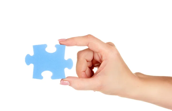 Modrý puzzle s rukou izolované na bílém — Stock fotografie