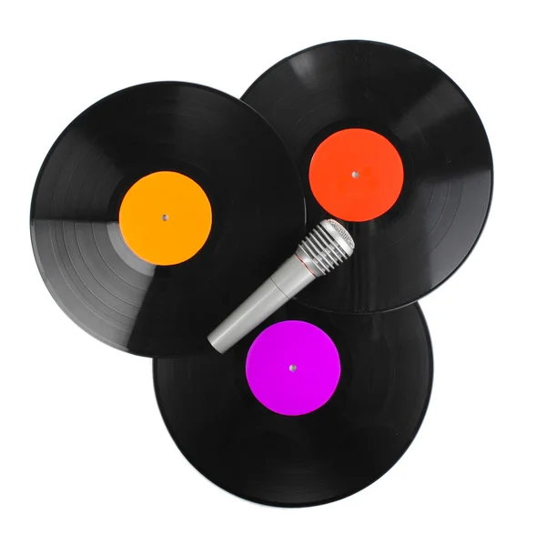 Černý vinyl records a mikrofon izolovaných na bílém — Stock fotografie