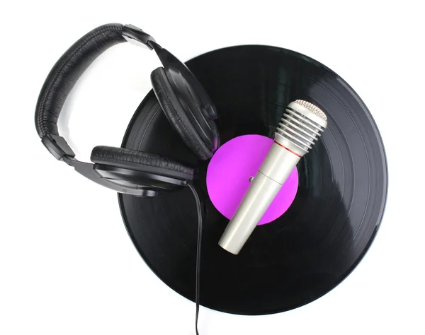 Svart vinylskiva med hörlurar och mikrofon isolerad på vit — Stockfoto