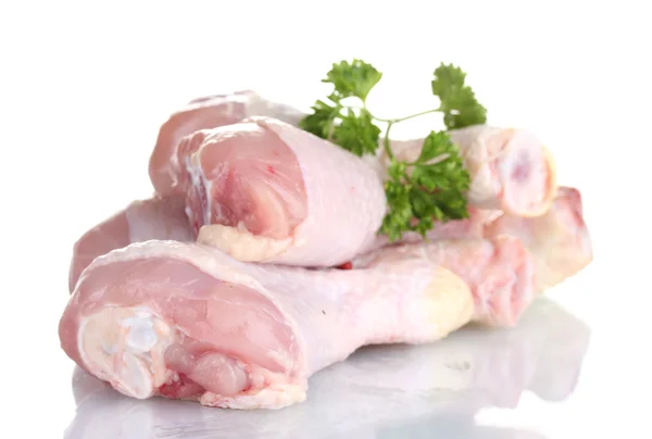 Raw Chicken Drumsticks in plate with parsley isolated on white — Stock Photo, Image
