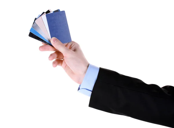 Mano de hombre con tarjetas de crédito aisladas en blanco — Foto de Stock