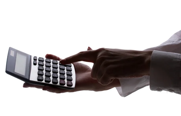 Σκιαγραφία από γυναικεία χέρια με την αριθμομηχανή που απομονώνονται σε λευκό — Φωτογραφία Αρχείου