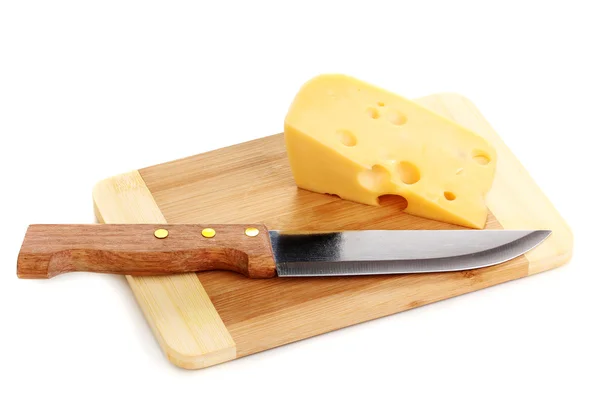 Cheese on cutting board with knife isolated on white Royalty Free Stock Photos