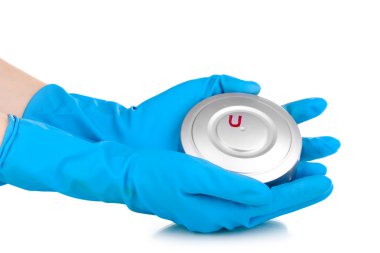 Uranium in hands isolated on white clipart