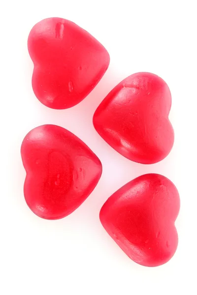 Bonbons rouges coeurs isolés sur blanc — Photo