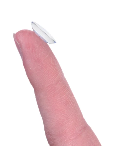 Φακός επαφής σε δάκτυλο που απομονώνεται σε λευκό — Φωτογραφία Αρχείου