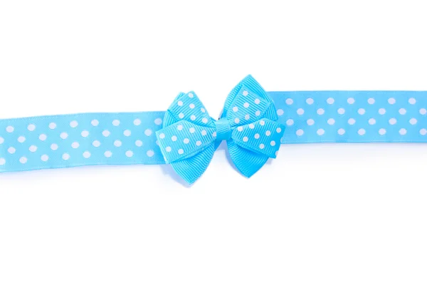 Hermoso arco azul y cinta aislada en blanco —  Fotos de Stock
