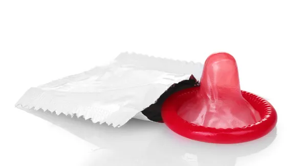 stock image Red condom with open pack isolated on white
