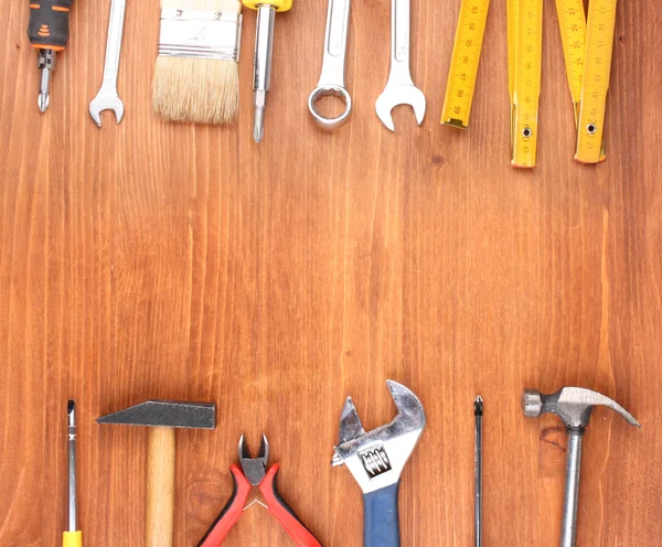 Strumenti su fondo di legno — Foto Stock