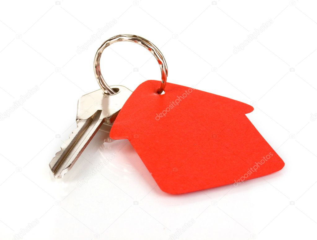 Key with house-shaped charm isolated on white