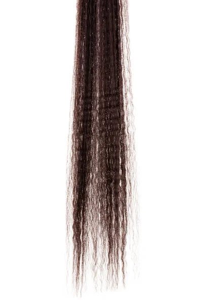 Vlnité hnědé vlasy izolovaných na bílém — Stock fotografie