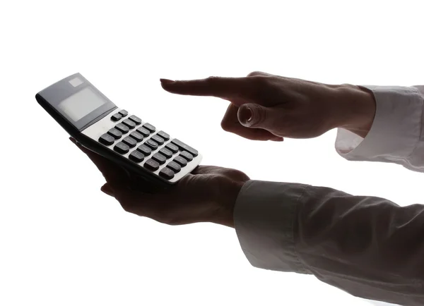 Silhueta de mãos de mulheres com calculadora isolada em branco — Fotografia de Stock
