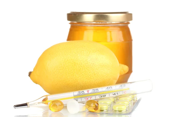 Miel, limón y termómetro aislados en blanco —  Fotos de Stock