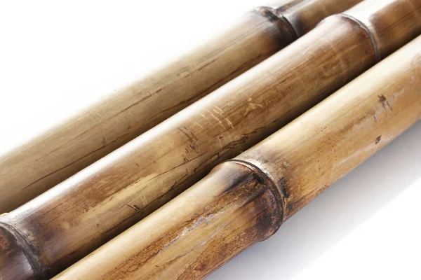 Kuru bambu sopalarla üzerinde beyaz izole — Stok fotoğraf