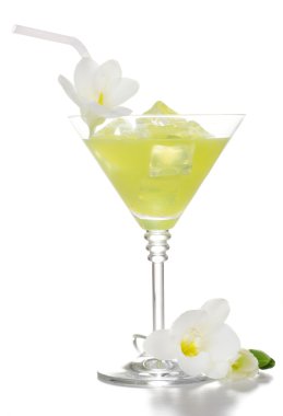 Martini glass of cocktail with ice and flowers isolated on white