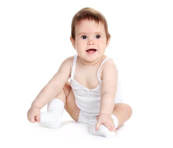 Schattige babymeisje zit geïsoleerd op wit — Stockfoto