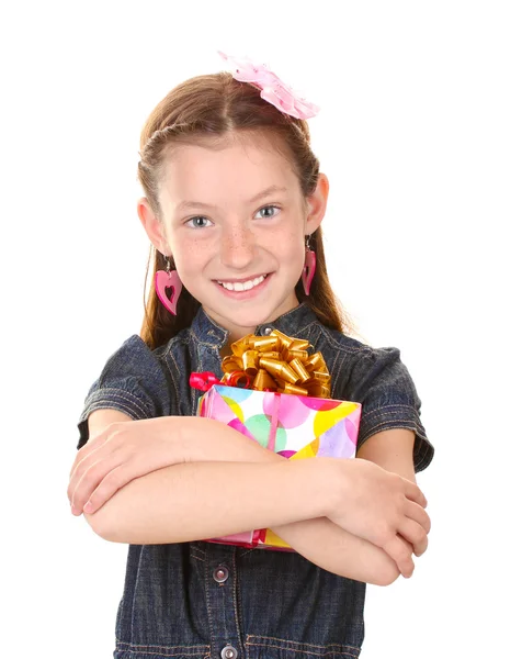 Little girl with gift isolated on white — Stock Photo, Image