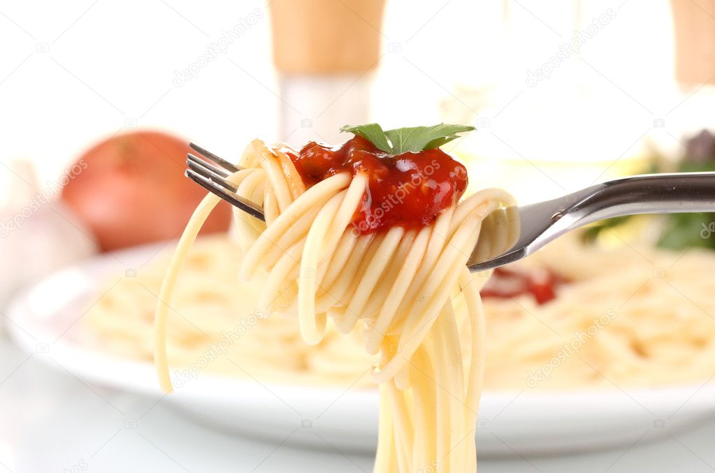 Composition of the delicious spaghetti on white background close-up