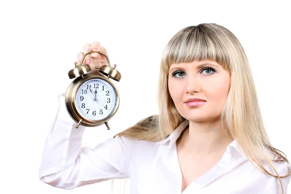 Jovem empresária segurando relógio isolado no branco — Fotografia de Stock
