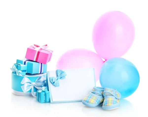 Beautiful gifts, babys bootees, blank postcard and balloons isolated on white — Stock Photo, Image