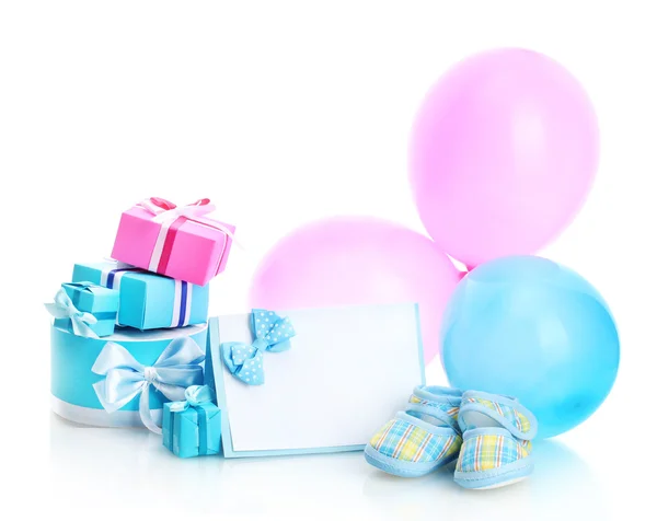 stock image Beautiful gifts, babys bootees, blank postcard and balloons isolated on white