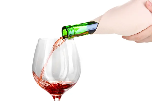 Verser le vin dans un verre isolé sur du blanc — Photo