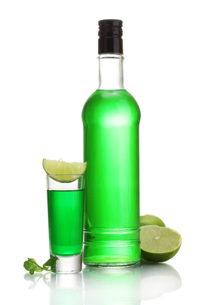 Bottle and glass of absinthe with lime isolated on white — Stock Photo, Image